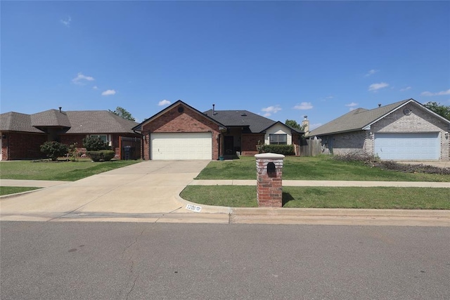 ranch-style house with a front lawn, concrete driveway, brick siding, and a garage