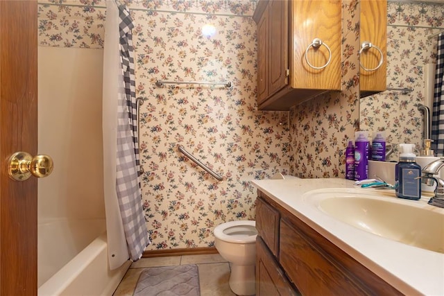 full bath with vanity, tile patterned floors, toilet, baseboards, and wallpapered walls