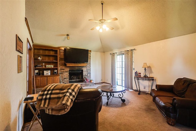 living room featuring carpet floors, ceiling fan, a fireplace, a textured ceiling, and lofted ceiling