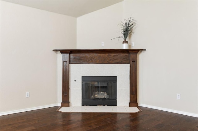 5309 SE 78th St, Oklahoma City, OK 73135 - detailed view of wood finished floors, baseboards, and a tile fireplace