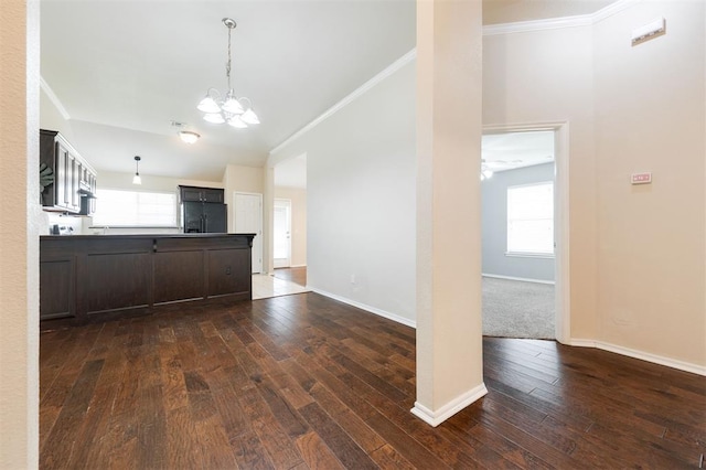 5309 SE 78th St, Oklahoma City, OK 73135 - kitchen with a chandelier, black fridge with ice dispenser, ornamental molding, dark wood-style flooring, and baseboards
