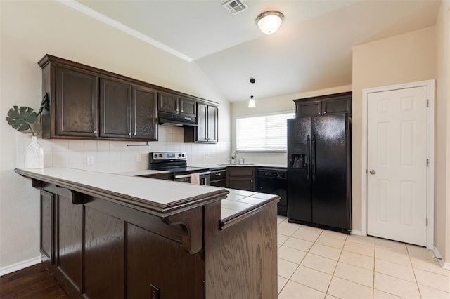 5309 SE 78th St, Oklahoma City, OK 73135 - kitchen with black appliances, lofted ceiling, a peninsula, a breakfast bar area, and dark brown cabinetry
