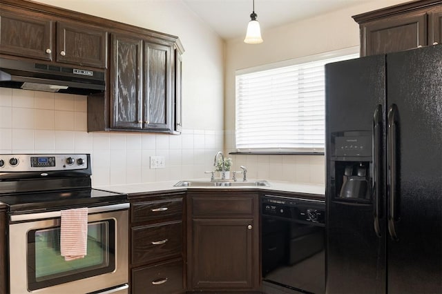 5309 SE 78th St, Oklahoma City, OK 73135 - kitchen with black appliances, under cabinet range hood, a sink, dark brown cabinets, and decorative backsplash