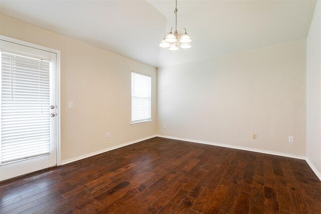 5309 SE 78th St, Oklahoma City, OK 73135 - unfurnished room with a chandelier, dark wood-style floors, baseboards, and vaulted ceiling