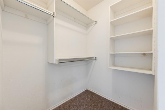 5309 SE 78th St, Oklahoma City, OK 73135 - spacious closet featuring dark carpet