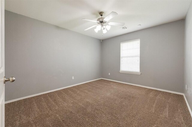5309 SE 78th St, Oklahoma City, OK 73135 - spare room featuring carpet flooring, ceiling fan, and baseboards