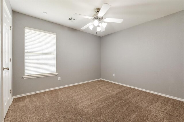 5309 SE 78th St, Oklahoma City, OK 73135 - spare room with carpet, a ceiling fan, and baseboards