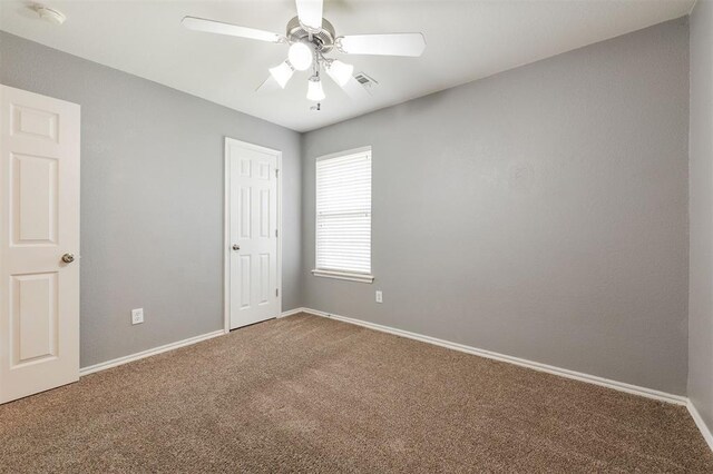 5309 SE 78th St, Oklahoma City, OK 73135 - unfurnished bedroom with carpet flooring, baseboards, ceiling fan, and a closet