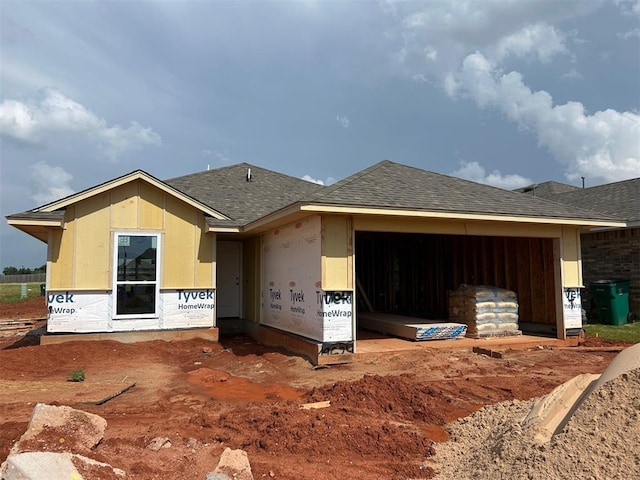 19624 Canning Rd, Edmond, OK 73012 - property in mid-construction featuring a garage and a shingled roof