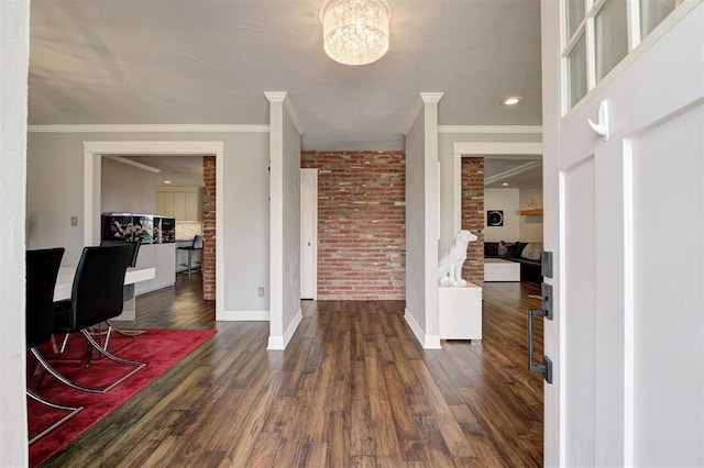 7712 Rumsey Rd, Oklahoma City, OK 73132 - foyer entrance with dark wood-style flooring, ornamental molding, and baseboards