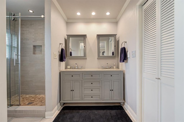 7712 Rumsey Rd, Oklahoma City, OK 73132 - full bathroom featuring a shower stall, crown molding, and a sink