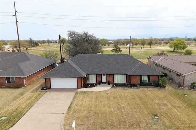 7712 Rumsey Rd, Oklahoma City, OK 73132 - ranch-style house featuring driveway, a front yard, brick siding, a garage, and a shingled roof