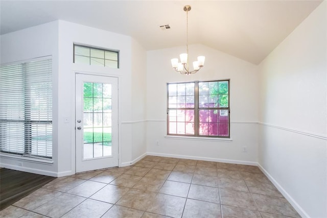 1417 Mayer Dr, Yukon, OK 73099 - doorway featuring a chandelier, vaulted ceiling, and tile patterned floors