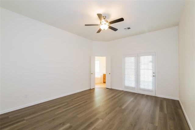 1417 Mayer Dr, Yukon, OK 73099 - spare room featuring wood finished floors and ceiling fan