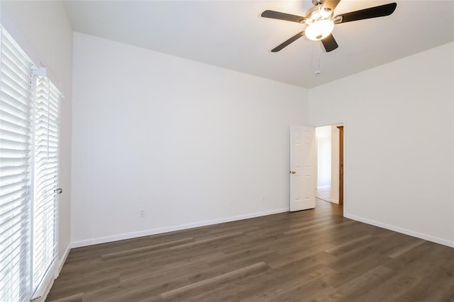 1417 Mayer Dr, Yukon, OK 73099 - unfurnished bedroom with dark wood finished floors and a ceiling fan