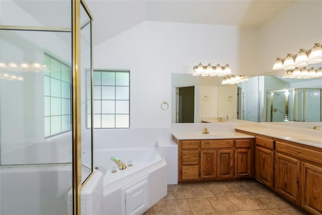 1417 Mayer Dr, Yukon, OK 73099 - full bathroom featuring double vanity, vaulted ceiling, a garden tub, a shower stall, and a chandelier