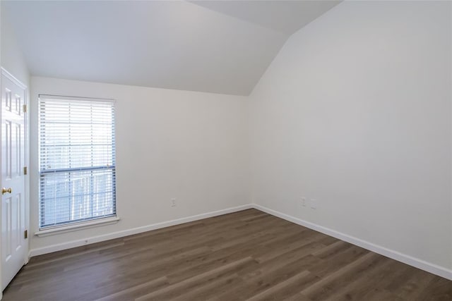 1417 Mayer Dr, Yukon, OK 73099 - bonus room with vaulted ceiling and dark wood finished floors