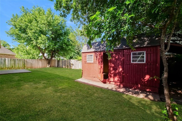 1417 Mayer Dr, Yukon, OK 73099 - fenced backyard featuring a storage shed