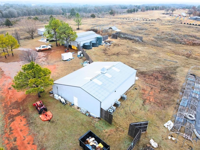 birds eye view of property featuring a rural view