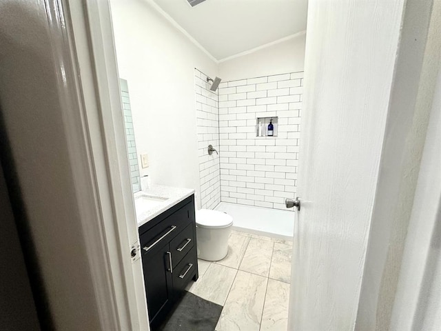 full bath with a stall shower, toilet, ornamental molding, and vanity
