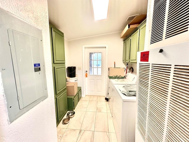 washroom featuring electric panel, separate washer and dryer, a heating unit, marble finish floor, and cabinet space