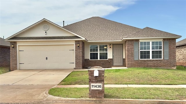 ranch-style house with brick siding, a garage, driveway, roof with shingles, and a front lawn