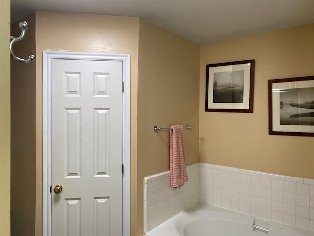 full bathroom featuring a garden tub