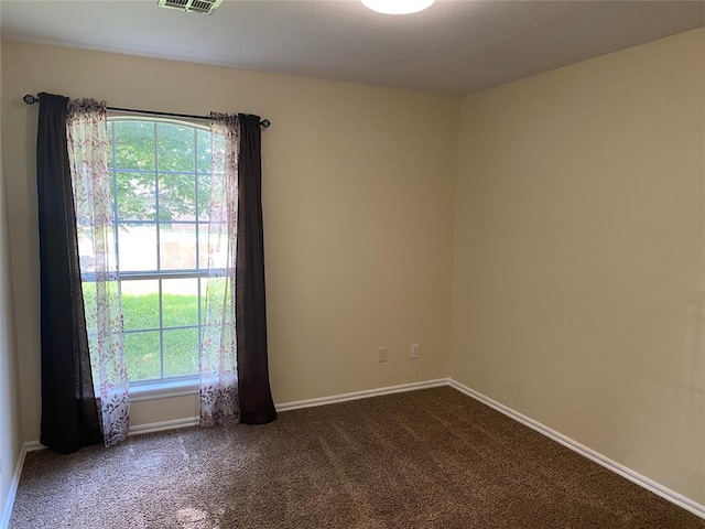 17413 Platinum Ln, Edmond, OK 73012 - unfurnished room with dark carpet and baseboards