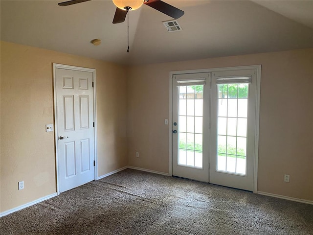 17413 Platinum Ln, Edmond, OK 73012 - unfurnished room with lofted ceiling, ceiling fan, carpet floors, and baseboards