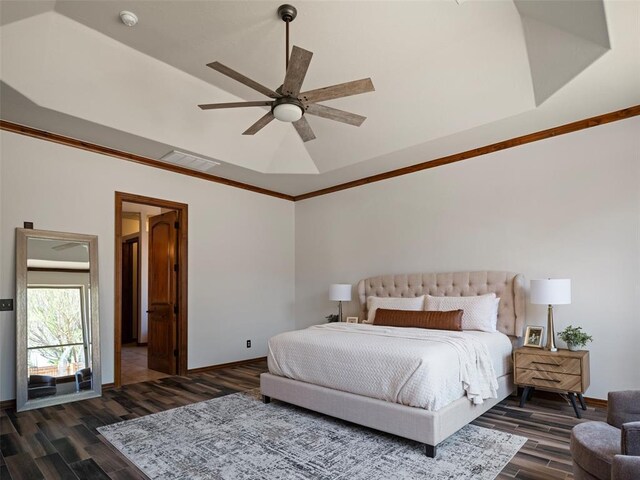 bedroom featuring crown molding, ceiling fan, dark wood finished floors, visible vents, and baseboards