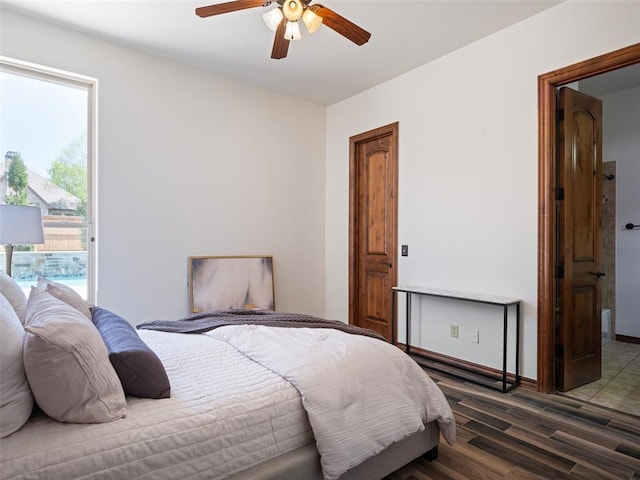4200 Slate Bridge Rd, Edmond, OK 73034 - bedroom with wood finished floors and a ceiling fan