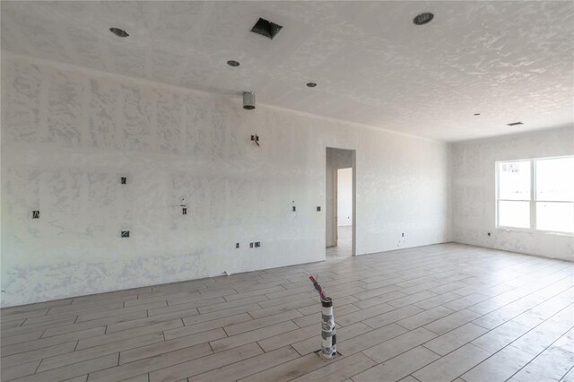 9204 SW 35th St, Oklahoma City, OK 73179 - unfurnished room with wood finished floors