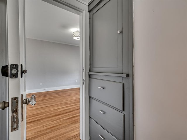1016 E Edwards St, Edmond, OK 73034 - interior space featuring baseboards and wood finished floors
