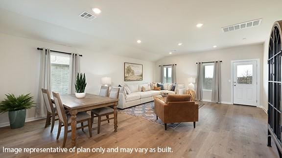 5510 Windstone Ln, Norman, OK 73072 - living area with healthy amount of natural light, light wood finished floors, recessed lighting, and baseboards