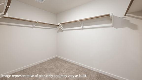 5510 Windstone Ln, Norman, OK 73072 - walk in closet featuring carpet
