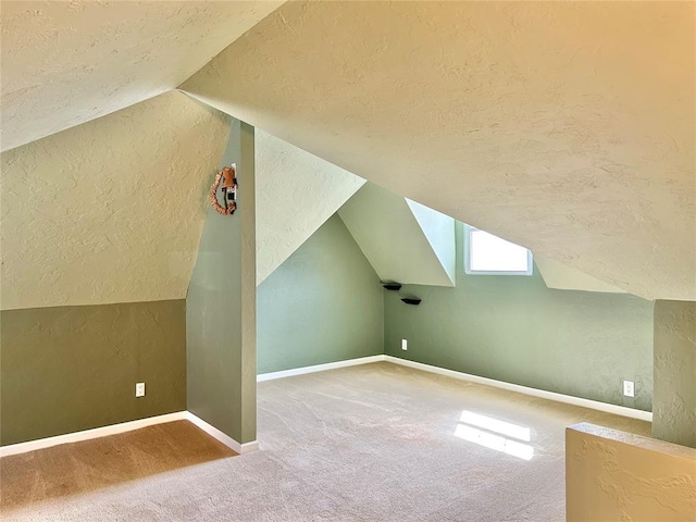 1909 N Gatewood Ave, Oklahoma City, OK 73106 - additional living space with baseboards, a textured wall, and a textured ceiling