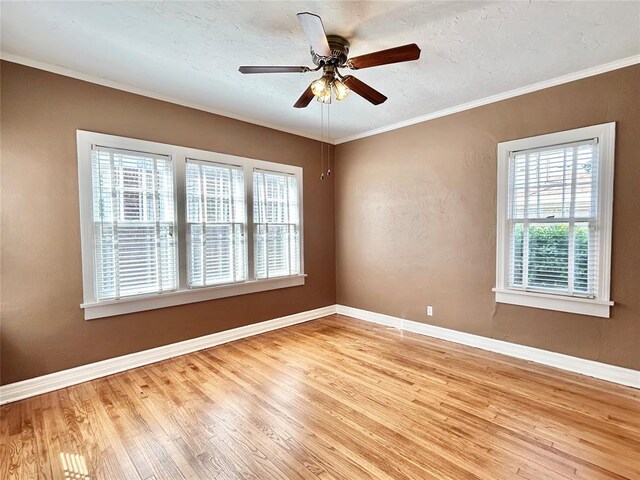 1909 N Gatewood Ave, Oklahoma City, OK 73106 - unfurnished room with ornamental molding, baseboards, and wood finished floors