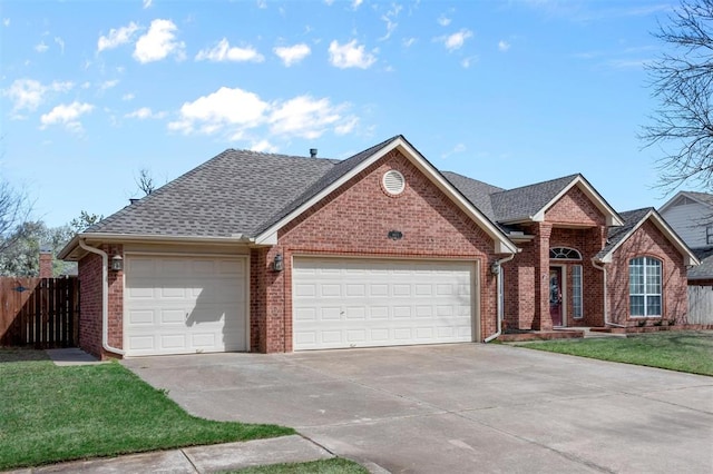 4113 Annalane Dr, Norman, OK 73072 - single story home featuring a front yard, concrete driveway, fence, brick siding, and a garage