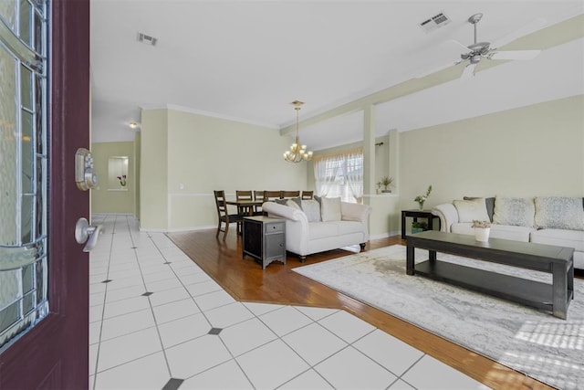 4113 Annalane Dr, Norman, OK 73072 - living area with baseboards, ornamental molding, visible vents, and light tile patterned floors