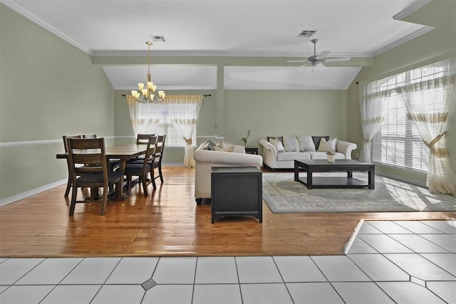 4113 Annalane Dr, Norman, OK 73072 - living room with visible vents, tile patterned flooring, and ornamental molding