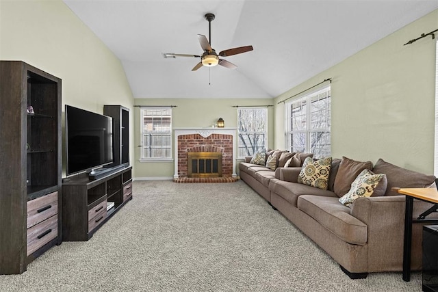 4113 Annalane Dr, Norman, OK 73072 - living area featuring carpet, a brick fireplace, baseboards, ceiling fan, and vaulted ceiling