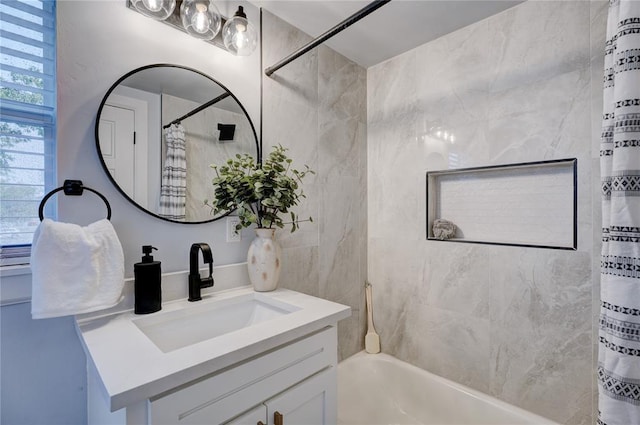 full bathroom featuring shower / bath combination with curtain and vanity