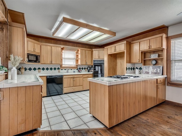 27704 S County Line Ave, Blanchard, OK 73010 - kitchen with open shelves, light brown cabinets, tile countertops, decorative backsplash, and black appliances