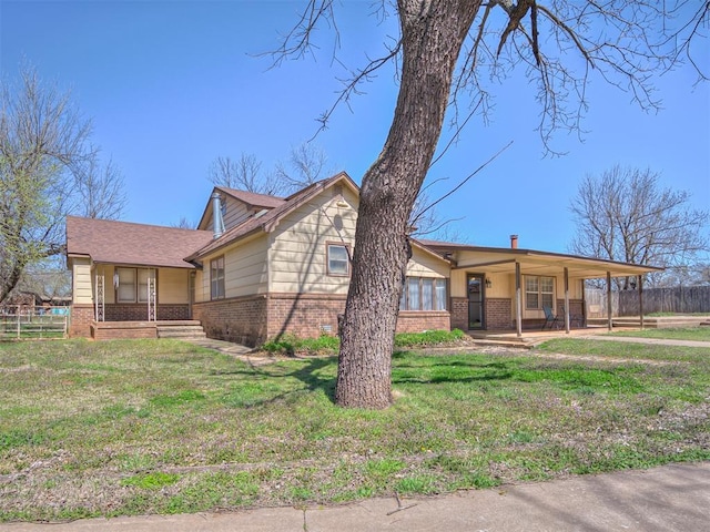 27704 S County Line Ave, Blanchard, OK 73010 - ranch-style home featuring fence, covered porch, brick siding, and a front yard