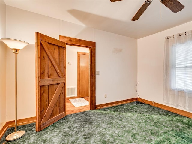 27704 S County Line Ave, Blanchard, OK 73010 - unfurnished room featuring baseboards, visible vents, carpet, and ceiling fan
