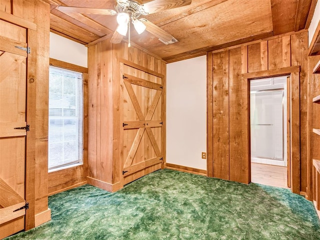 27704 S County Line Ave, Blanchard, OK 73010 - unfurnished bedroom with wooden walls, carpet flooring, and wood ceiling