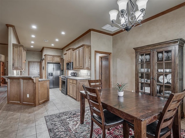 904 Majestic St, Yukon, OK 73099 - dining space with crown molding, a chandelier, light tile patterned floors, and recessed lighting