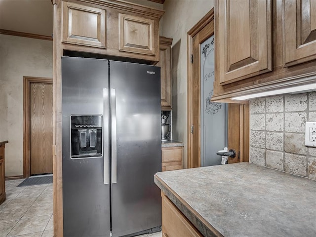 904 Majestic St, Yukon, OK 73099 - kitchen featuring stainless steel fridge, light tile patterned floors, and light countertops