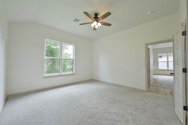 128 E 7th St, Arcadia, OK 73007 - spare room featuring light carpet, ceiling fan, baseboards, lofted ceiling, and a smoke detector