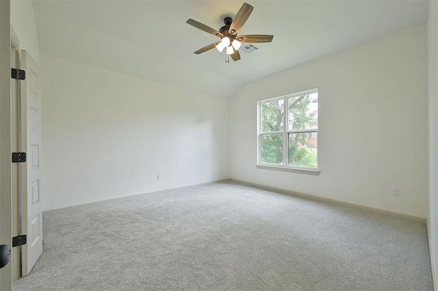 128 E 7th St, Arcadia, OK 73007 - carpeted empty room with a ceiling fan, lofted ceiling, and baseboards